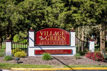 village on the green sign